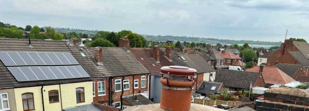 This is a photo taken from a roof which is being repaired by Long Eaton Roofing Repairs, it shows a street of houses, and their roofs