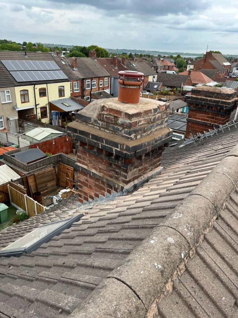 This is a photo taken from a roof which is being repaired by Long Eaton Roofing Repairs, it shows a street of houses, and their roofs